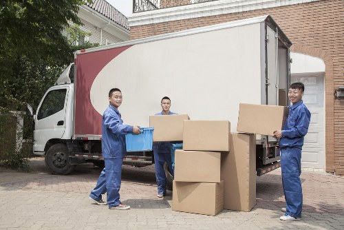 Staff handling storage operations safely inside Sandsend Storage