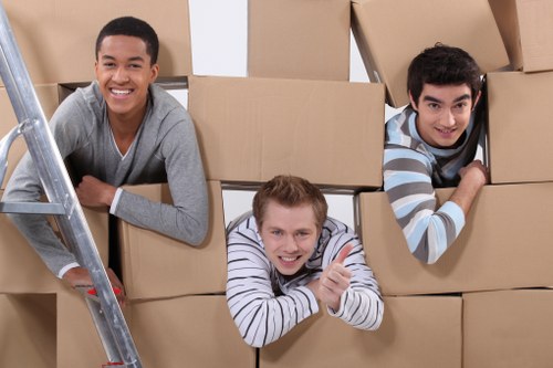 Professional movers handling furniture during a local house removal in Sandsend