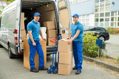 Packed moving boxes and furniture prepared for local removals in Sandsend