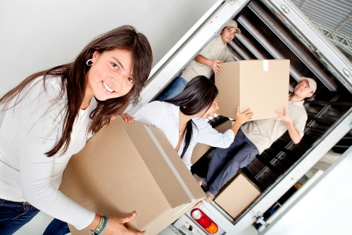 Professional movers loading items for a Sandsend relocation